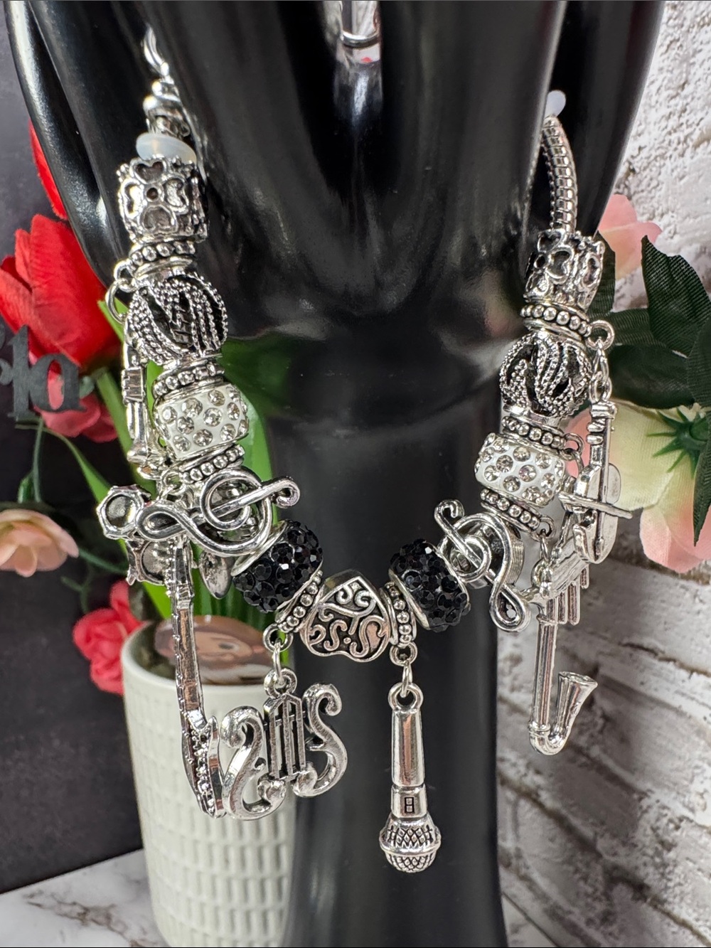 Silver Multi-Charm Women’s Bracelet with Black Accents